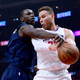 Gorgui Dieng of the Minnesota Timberwolves reaches in on Blake Griffin of the Los Angeles Clippers at Staples Center in Los Angeles on Jan. 22, 2018. (Harry How/Getty Images)
